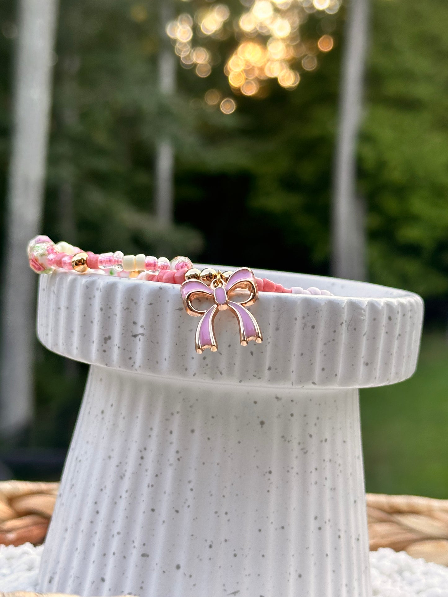 Floral Beaded Bracelet With Bow Charm